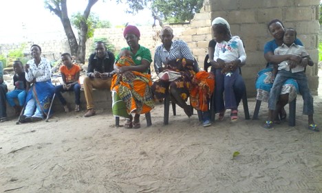 Parents of children with disabilities at a meeting with facilitators and volunteers in Machava Sede, Mozambique.